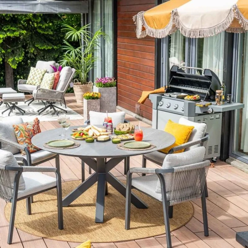 Monti tuinset 6-delig carbon black rope taupe met Lowland tuintafel rond 150 cm napoli sand